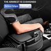 A black PU leather car armrest cover with a storage bag is shown on a vehicle interior.