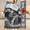 A custom photo flannel blanket featuring a couple smiling while holding a map.