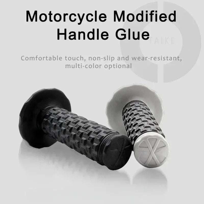 A close-up view of motorcycle modified handle glue grips, showing a black textured grip and a white silicone cap.