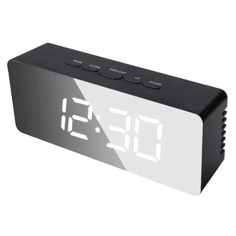 A black digital weather station clock displaying 12:30 with buttons for mode, alarm, sunlight, up, and down.