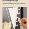 A white vertical opening design storage organizer with twelve hooks is shown being used to hang small accessories.