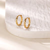 Boucles d'oreilles créoles en zircon cubique ton or