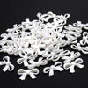 A pile of 100 white acrylic pearl spacer beads for jewelry making