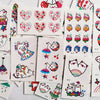 Colección de pegatinas temporales con diseños de luna, estrella, diablo y flor.
