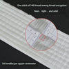 Close-up of white heavy duty tow rope showing a stitch and a ruler for measurement.