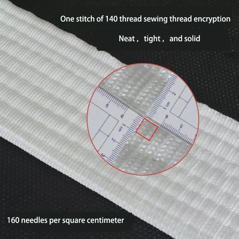 Close-up of white heavy duty tow rope showing a stitch and a ruler for measurement.