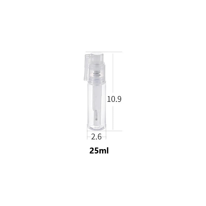 A clear glass refillable fine mist spray bottle with a white cap, showing dimensions 10.9 by 2.6 cm and a 25ml capacity.
