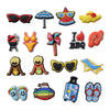 A collection of colorful PVC charms and pins featuring various shapes like a watermelon, heart, and shoe designs.