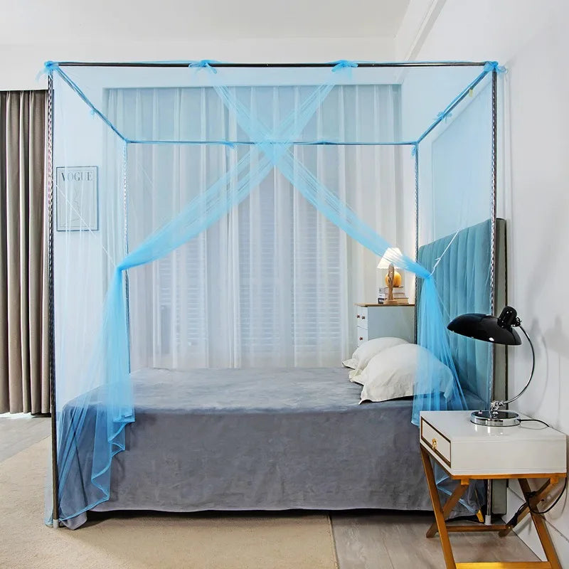 A princess-style lace canopy mosquito net draped over a bed in a bedroom setting.