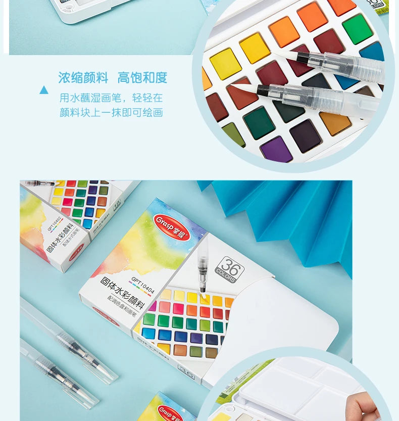 A watercolor paint set featuring various colors and water brush pens, displayed in an open box and on a white surface.