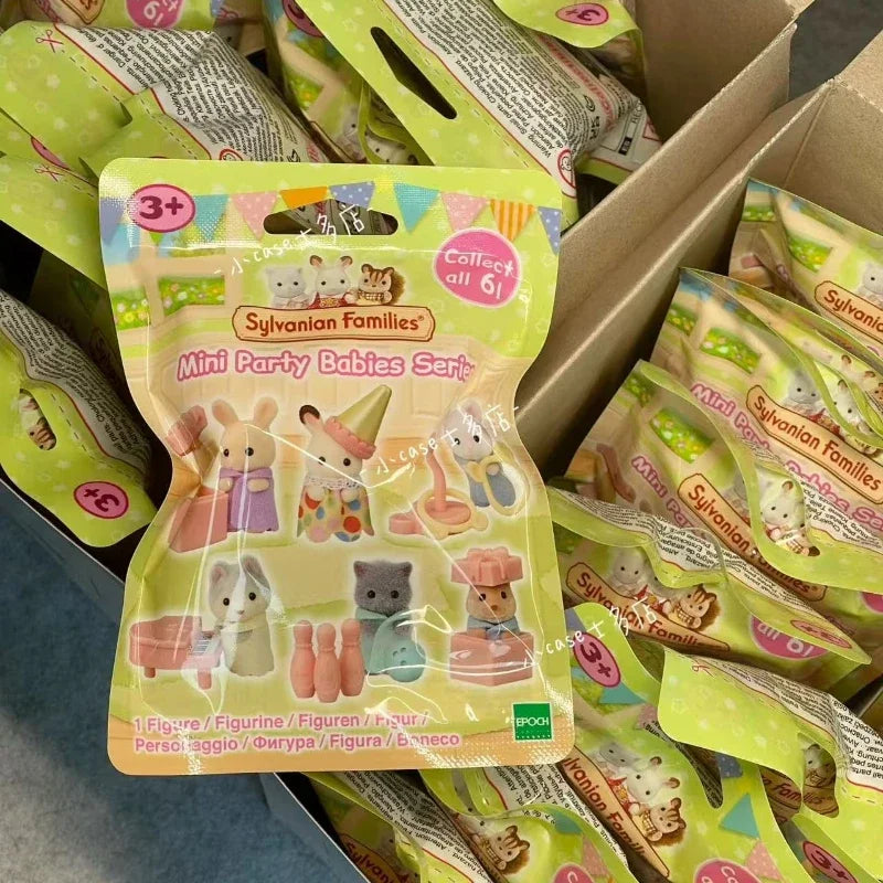 A collection of Sylvanian Families Mini Party Babies figures packaged in clear plastic bags.