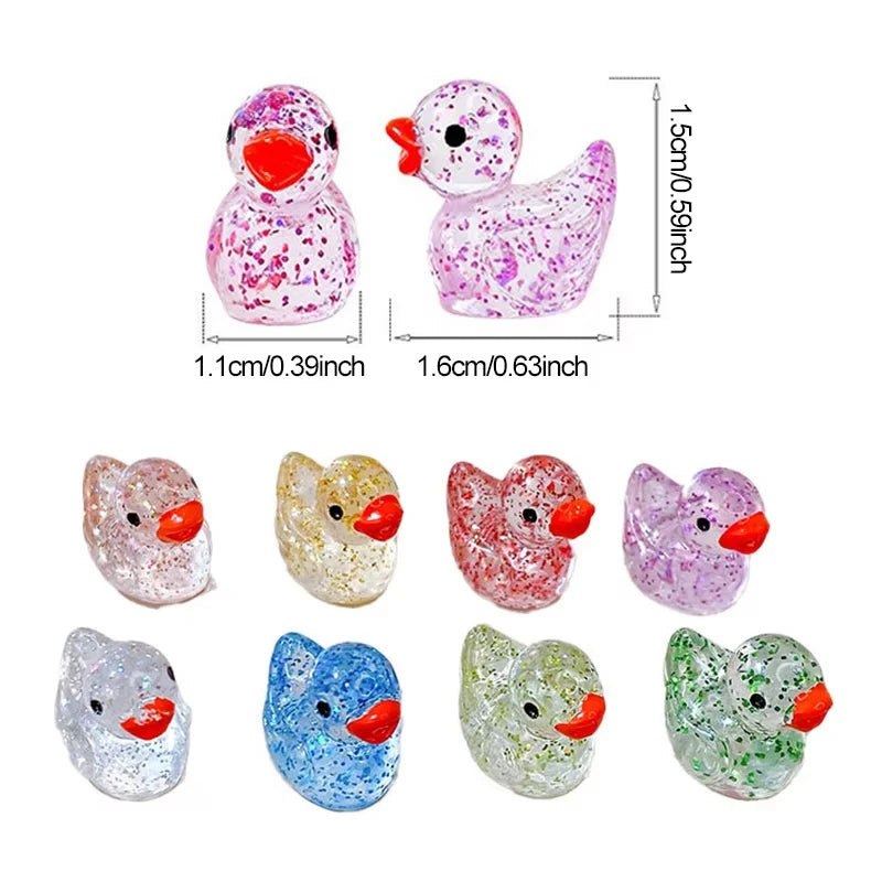 A set of ten glitter resin duck figurines in various colors and finishes for decorative use.