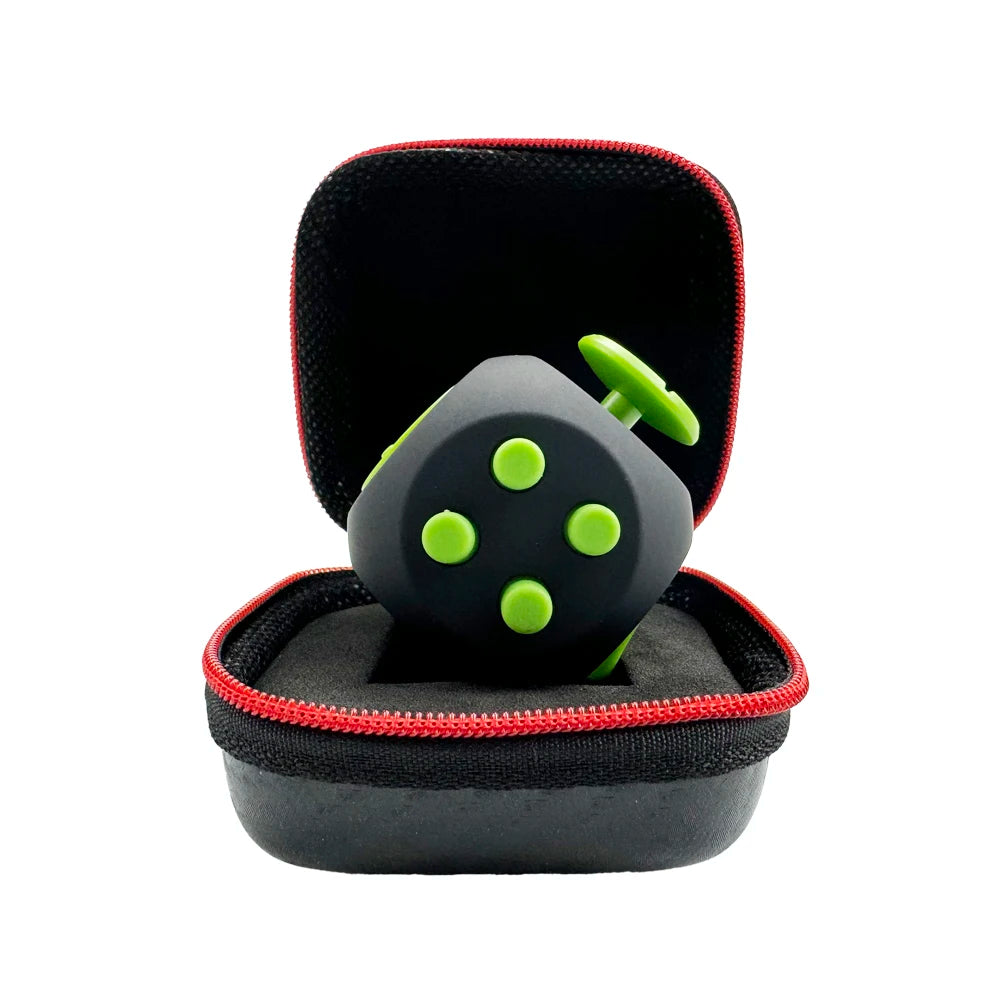 A black 12-sided fidget cube with green dots is shown inside a black storage case.