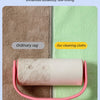 A pink reusable microfiber cleaning cloth is shown next to a green cloth, demonstrating its durability and low-linting proper