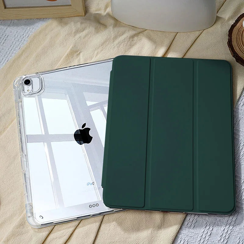 A dark green slim protective case for an iPad with a built-in pencil holder, resting on a light fabric.