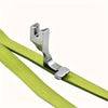 Stainless steel invisible zipper presser foot for sewing machines shown against a lime green fabric.