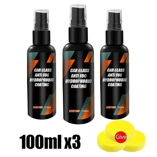 Three black glass spray bottles with yellow caps and labels for hydrophobic coating.