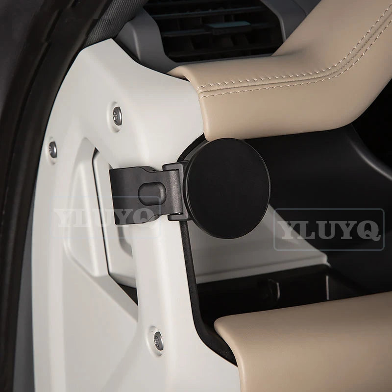 A magnetic car phone mount with a cup holder base shown in a close-up view.