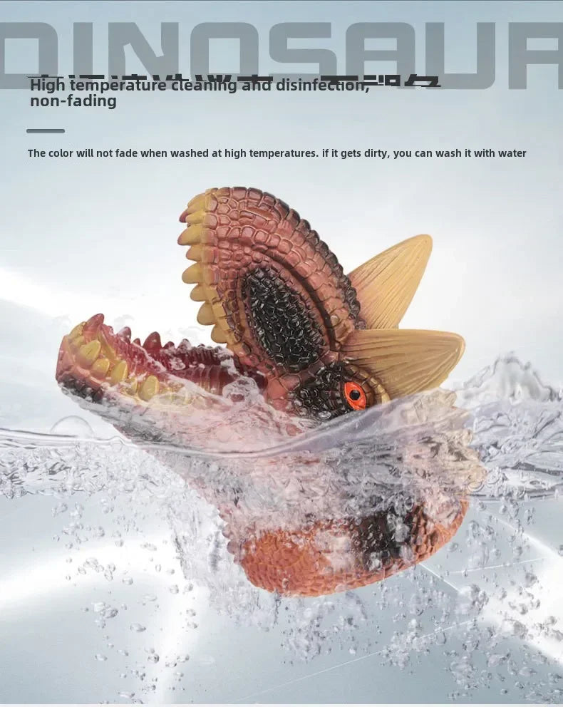 A realistic dinosaur hand puppet toy is being washed with water and soap bubbles.