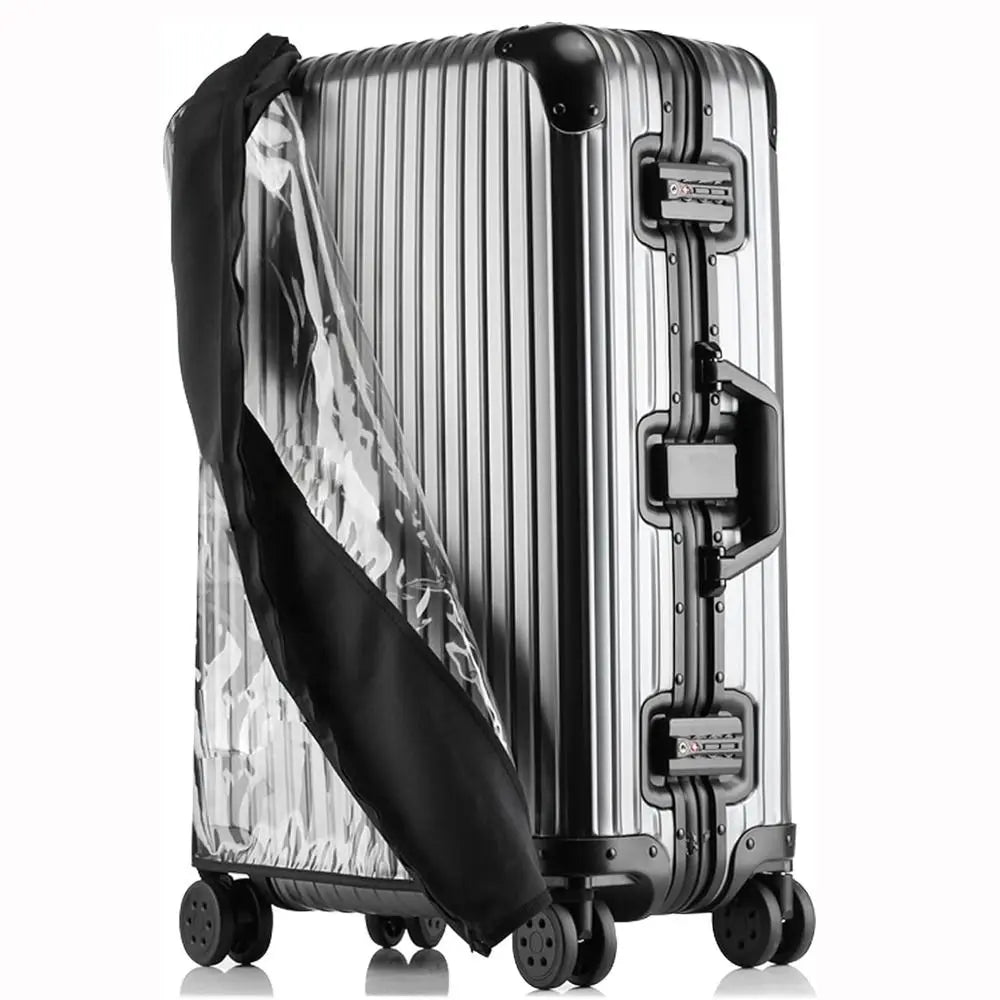 A silver suitcase with a transparent waterproof cover and black accents, shown from the side.