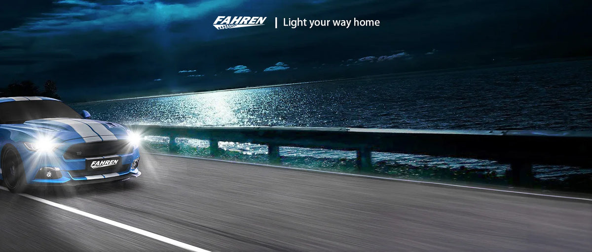 A blue car drives on a road with bright headlights at dusk, featuring Fahren LED lights.
