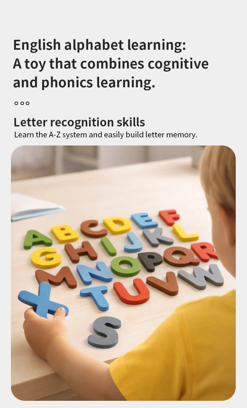 A child's hand is shown interacting with wooden letter cards spelling out the alphabet on a light wooden table.