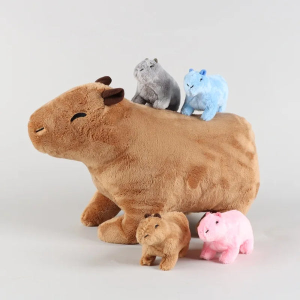 A brown stuffed capybara is surrounded by three small, pastel-colored animal figures.