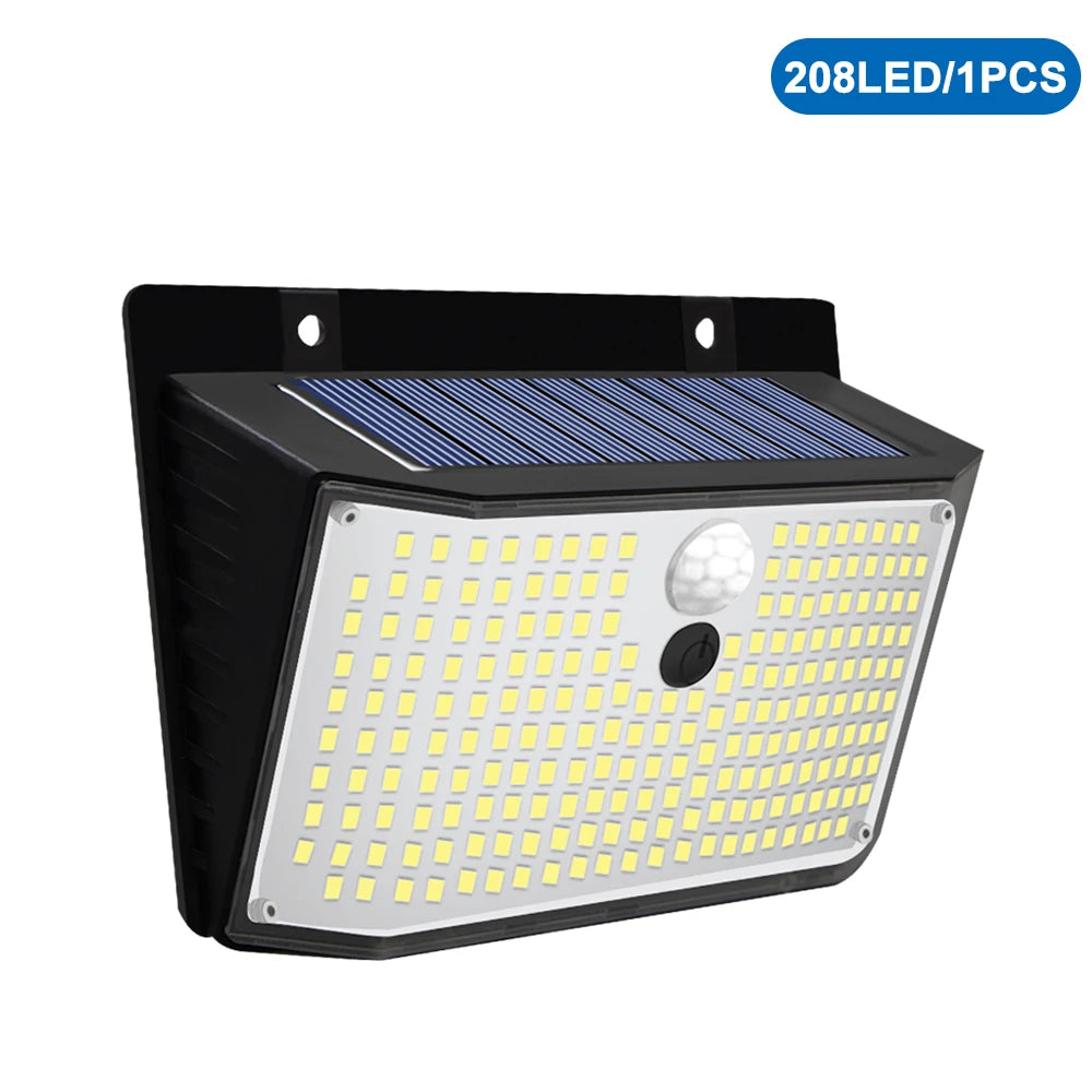 A black solar-powered security wall light with a silver panel and multiple LED lights.