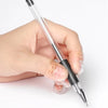 A hand holds a clear glass tube with a black tip, demonstrating gel toe caps for blister prevention.