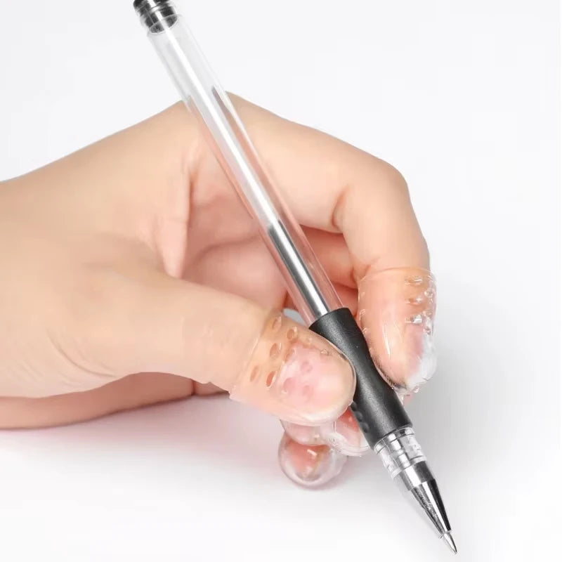 A hand holds a clear glass tube with a black tip, demonstrating gel toe caps for blister prevention.