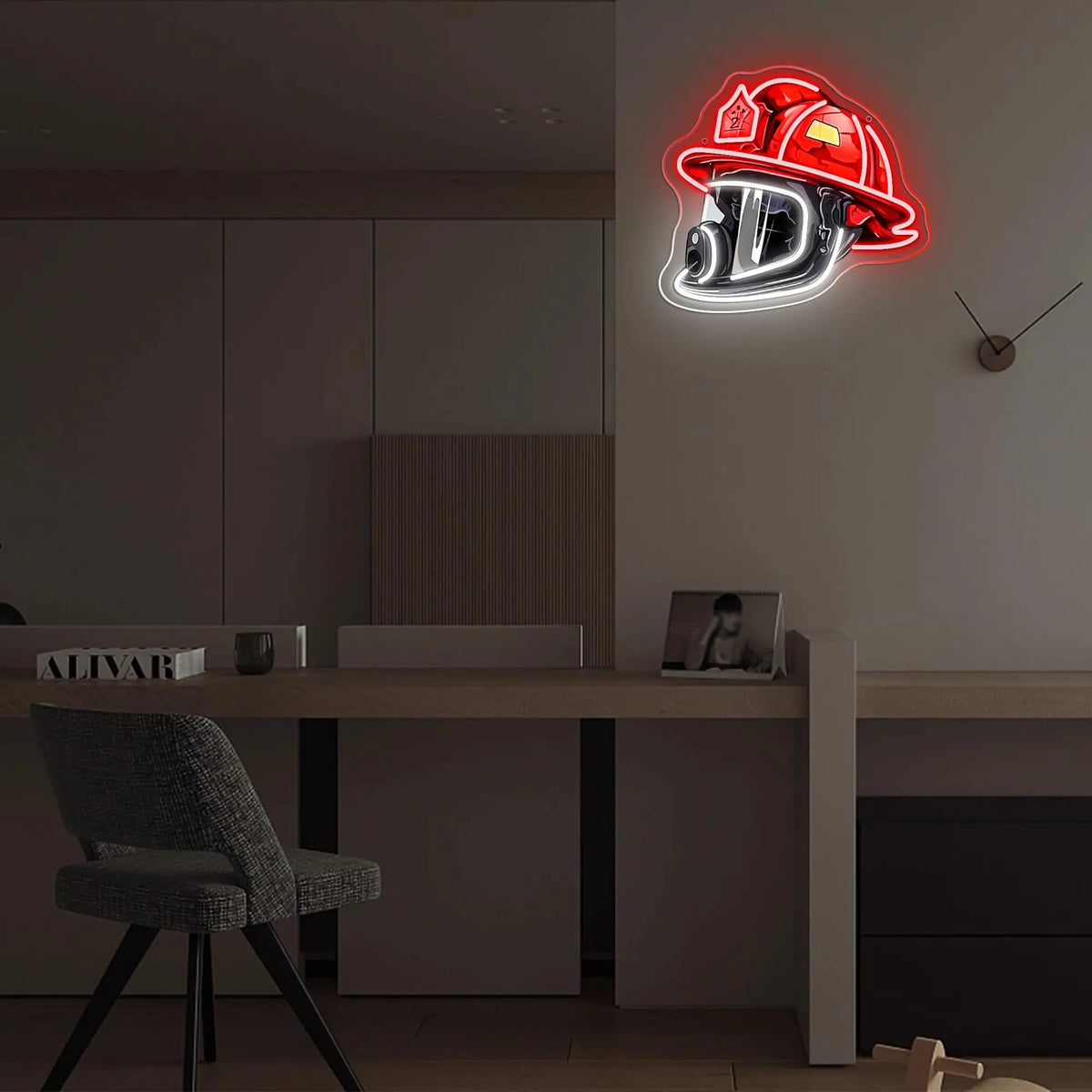 A red firefighter helmet neon sign with a silver letter D is mounted on a wall above a modern desk.