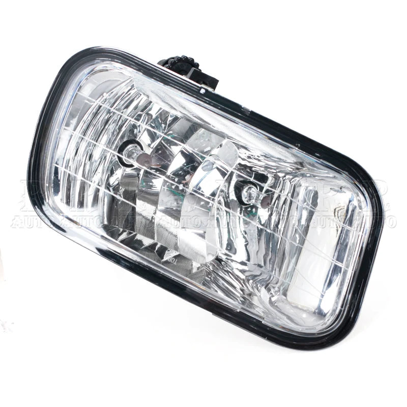 Clear rectangular fog light assembly for a Dodge Ram front bumper.