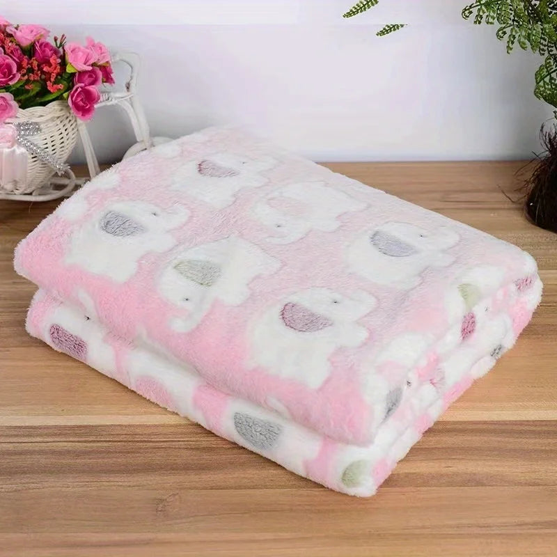Pink and white flannel pet blanket with cartoon elephant designs for dogs and cats