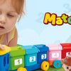 A young girl is playing with a colorful farm animal counting train that sorts numbers and matches.
