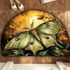 A half-round doormat featuring a whimsical boho dragonfly design in shades of green, yellow, and brown.