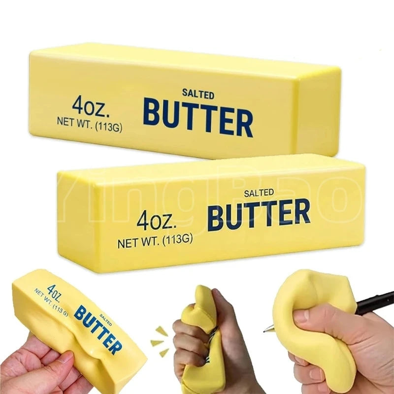 Yellow squishy butter fidget toys in various shapes and sizes shown being held by a hand
