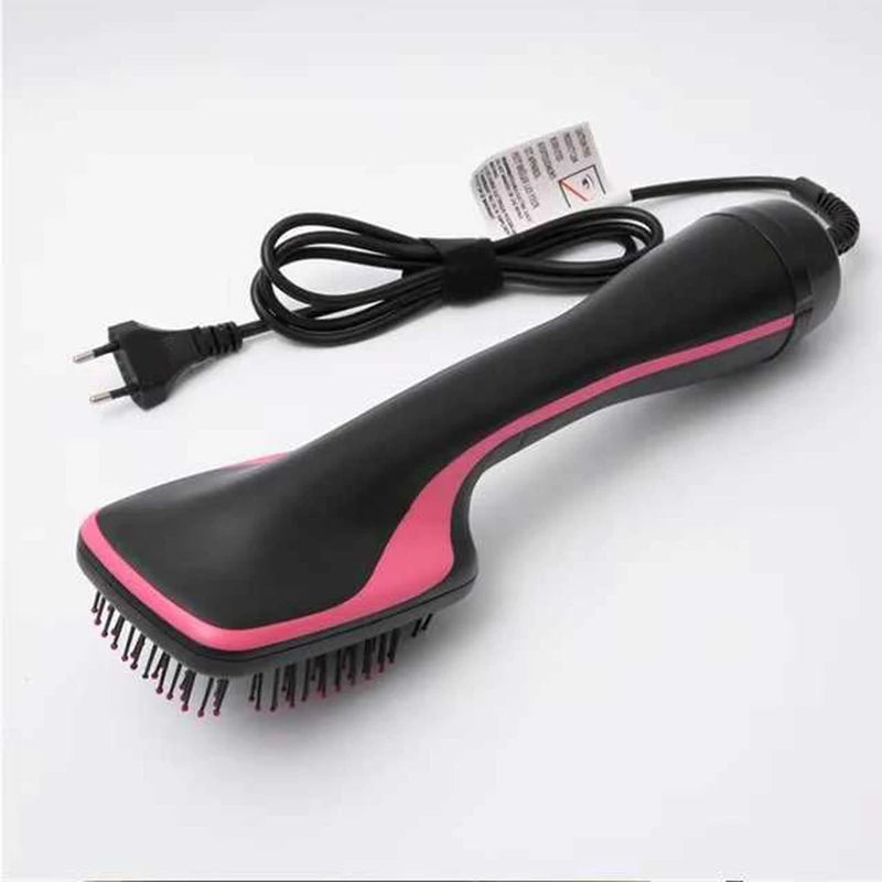 A black and pink 2-in-1 hot air brush dryer and styler with a cord shown on a white background.