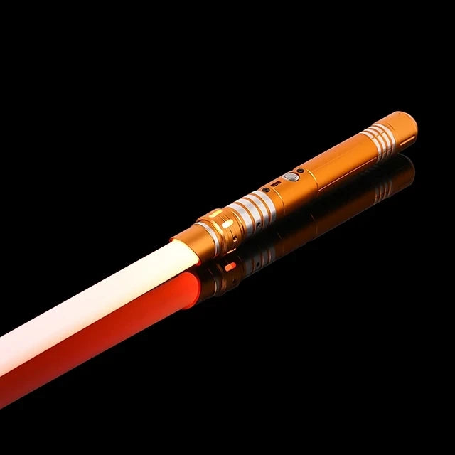An RGB metal lightsaber with a glowing red blade and an orange hilt against a black background.