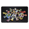 A collection of various die-cast pull-back cars in different colors and models displayed on a black surface.