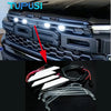White LED grille light kit for Ford Ranger Raptor featuring a custom light bar and clear protective cover.
