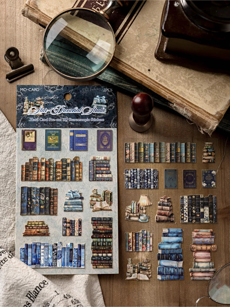 A collection of die-cut stickers and vintage-style paper elements for journaling and scrapbooking displayed on a wooden surfa