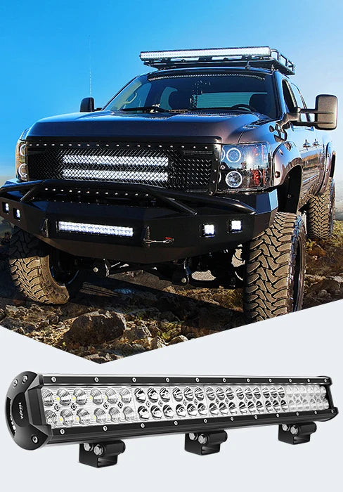 A close-up view of 18W LED flood light pods mounted on the front bumper of a black truck.