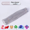 A bundle of light grey pipe cleaners with various colorful craft items displayed below.