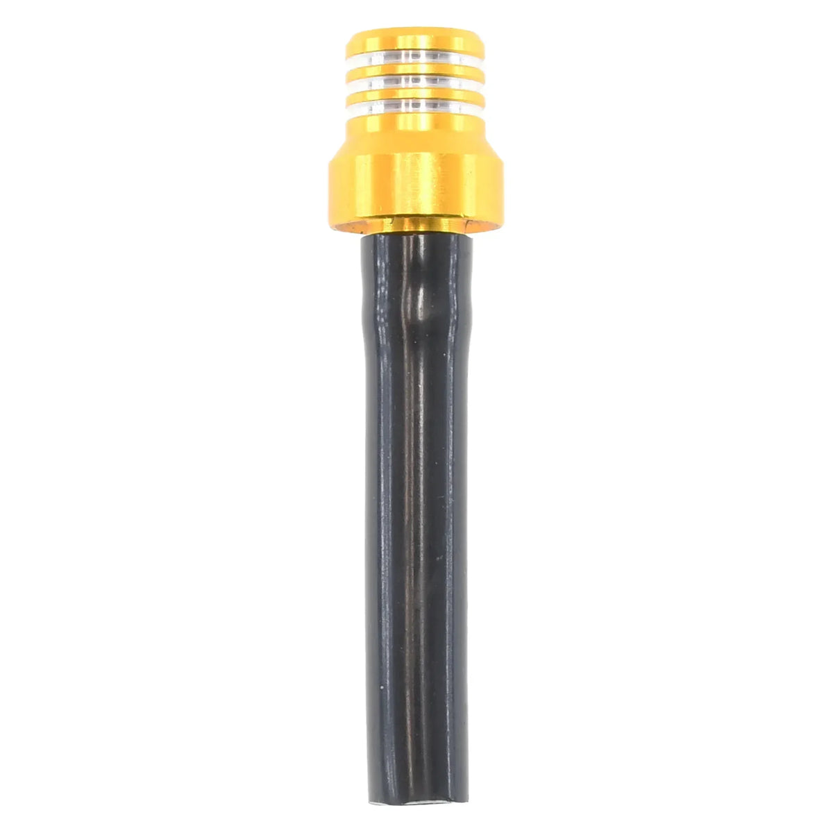 A brass and black fuel tank breather valve for a motorcycle.