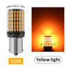 A close-up view of a yellow LED light bulb with a grid pattern, used for turn signals or brake lights.
