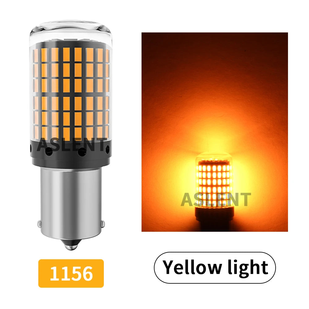 A close-up view of a yellow LED light bulb with a grid pattern, used for turn signals or brake lights.