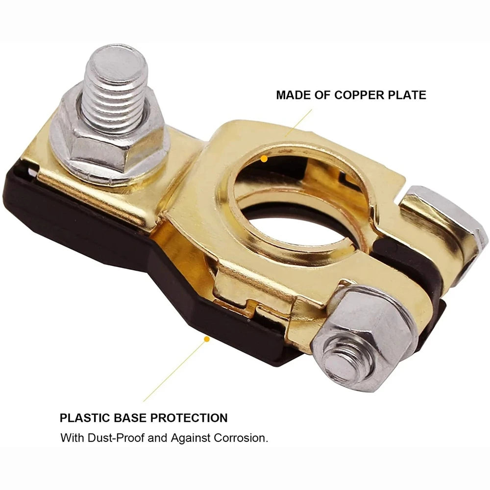 A close-up view of a gold-colored copper plate quick-release battery terminal with a black plastic base protection.
