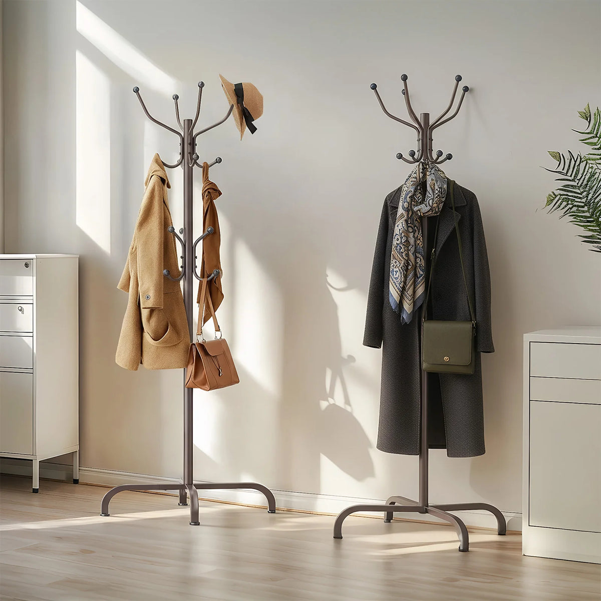 A freestanding metal coat rack with 14 hooks displaying coats and accessories in a bright room.