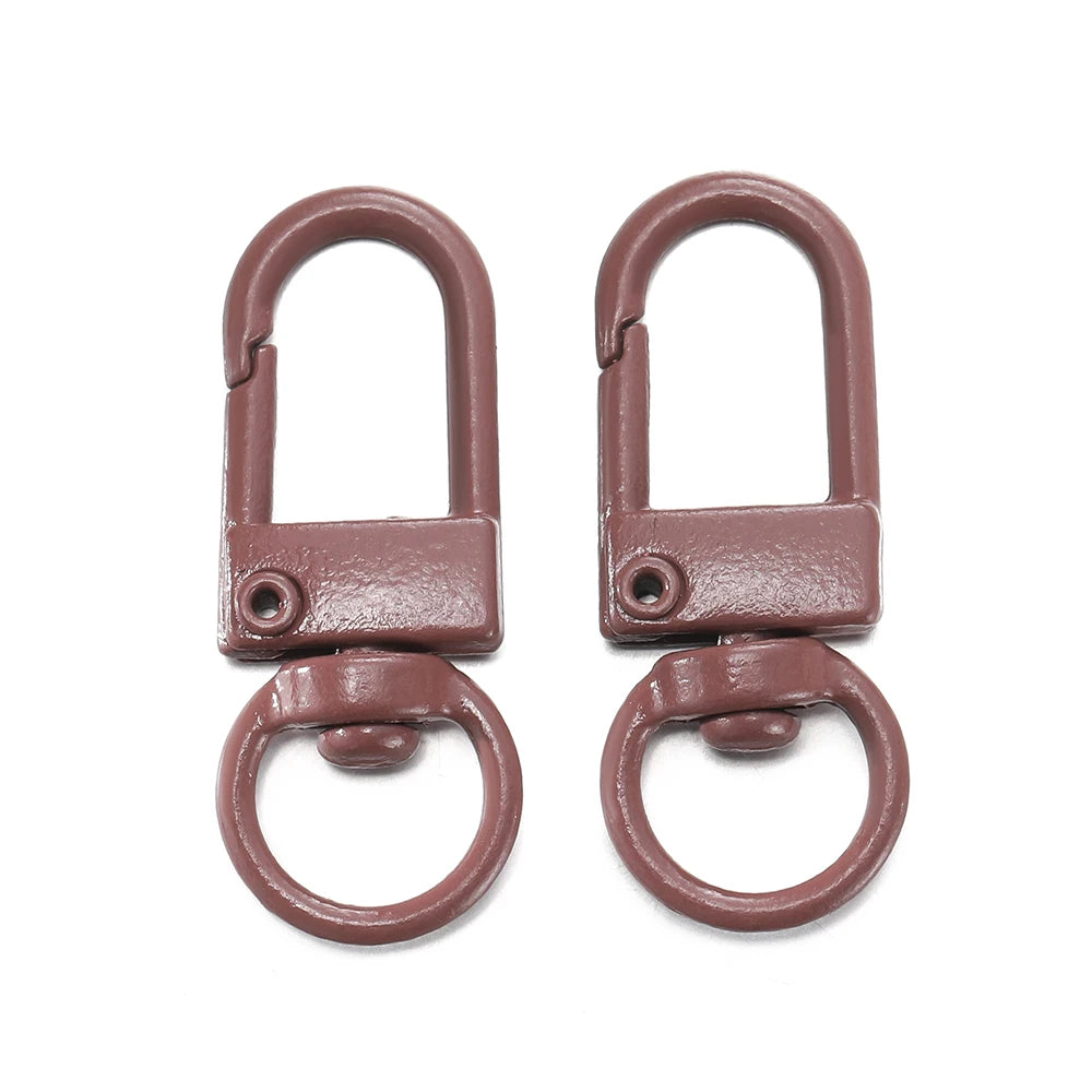 A pair of rose gold colored alloy lobster clasp hooks for DIY jewelry making