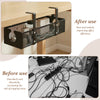 After use view of a black under desk cable management tray with a clamp-on design.